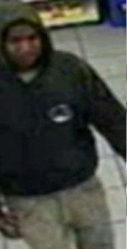 Trayvon Martin, surveillance video, wearing button.